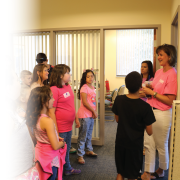 VP of Marketing, Paula Anderson, talks with children about financial literacy