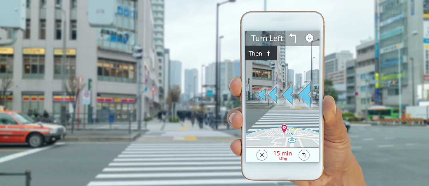 Someone holding up a smartphone using a navigation app in a