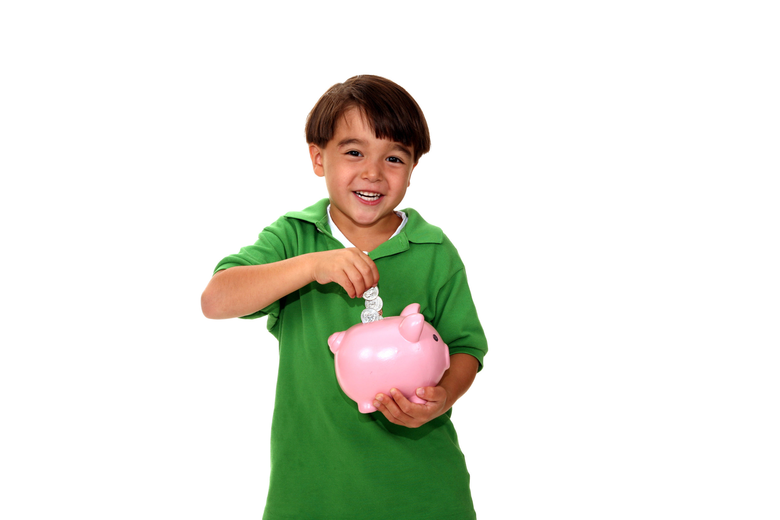 A kid putting change into a piggy bank